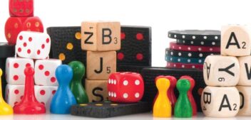 Come play with me — game board pieces.